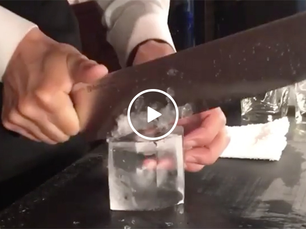 Bartender Sculpts a Diamond Out Of An Ice Cube For A Mixed Drink