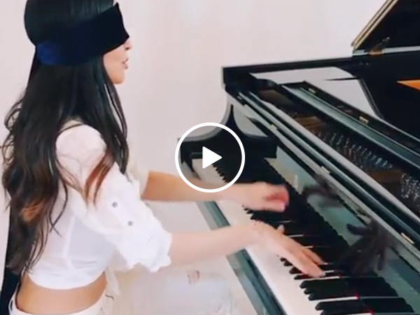 Cute piano player pulls off "La Campanella" blindfolded, turns my D-Flat into a D-Major (Video)