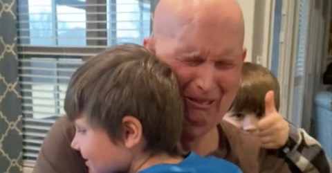 Students help a stroke survivor hug his grandkids (Video)
